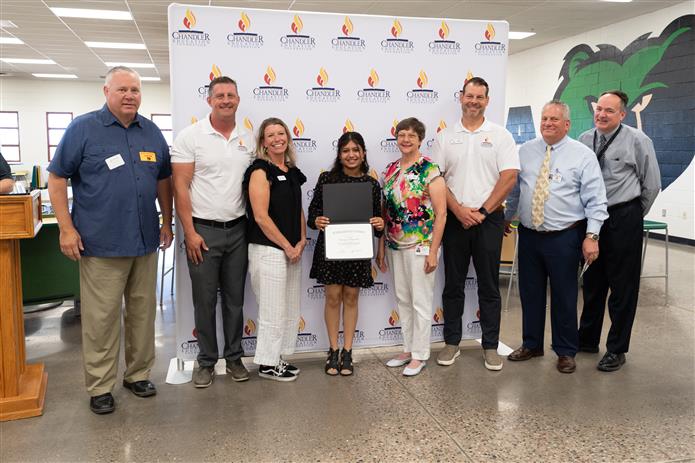 Haley Knutsen Memorial Scholarship recipient from Basha High with Chandler Education Foundation Board Members.